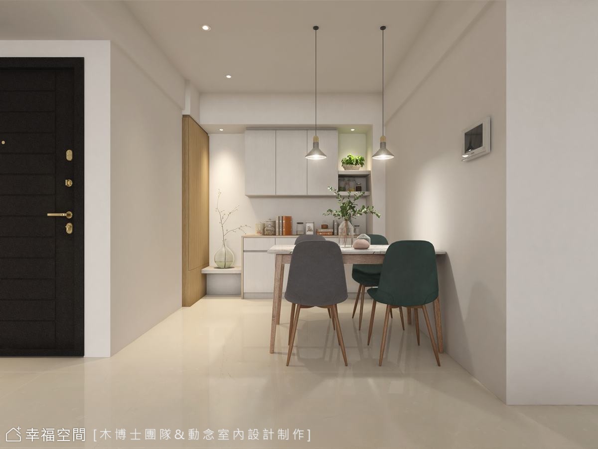 餐廳區域簡潔俐落，搭配吊燈營造溫馨用餐氛圍。